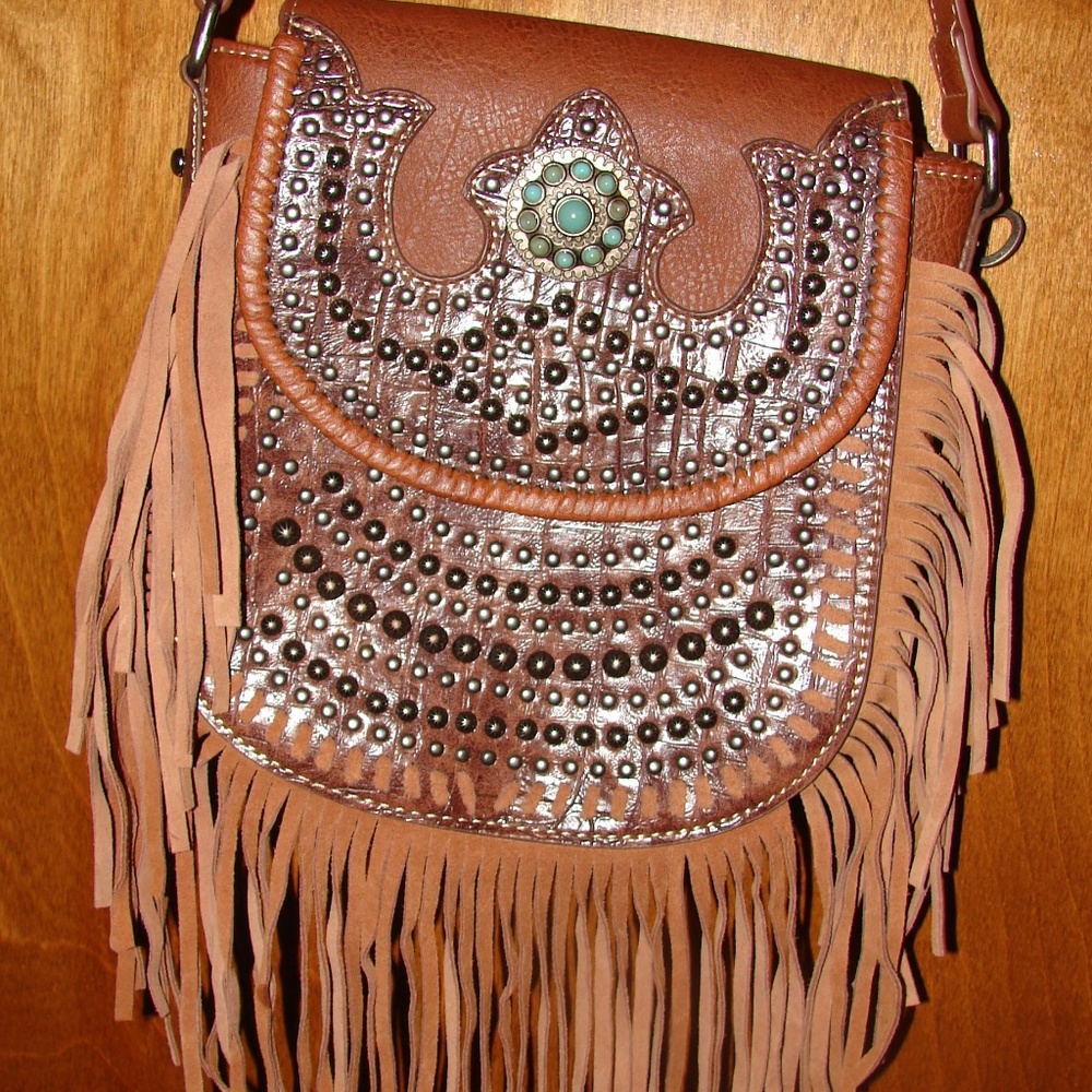 FRINGED CROSS BODY HAND BAG